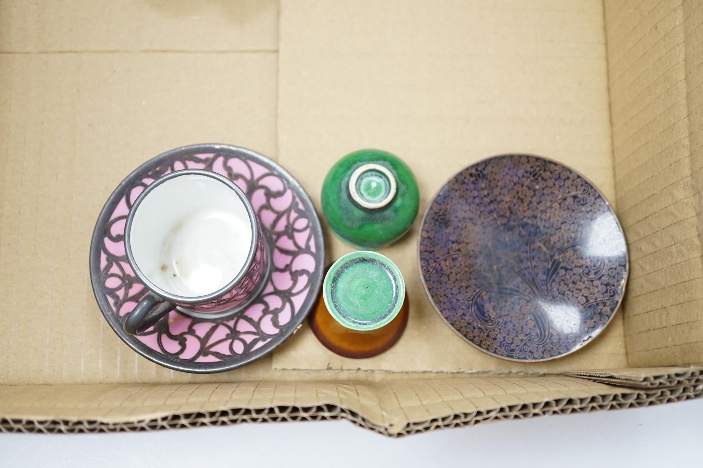 A collection of cabinet curiosities, including miniature cups, an ostrich egg, a Japanese marbled pottery teapot, a sand picture, snowmen cake decorations, etc. (2 trays). Condition - fair to good